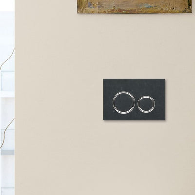 Sigma Round Dual Action Flush Plate with a slate and chrome finish lifestyle image