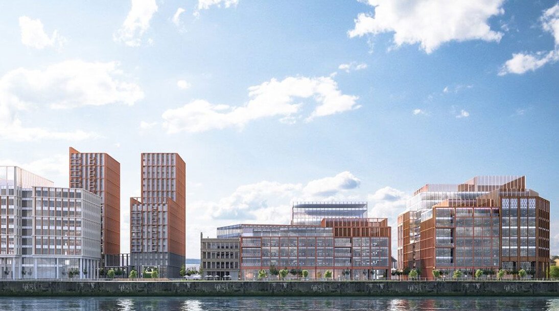 A CGI of the modern exterior view from across the water of the Barclays campus in Glasgow
