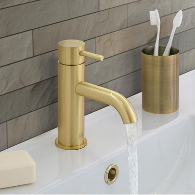 One hole deck mounted Libero Lever Basin Tap with a brushed brass finish lifestyle image