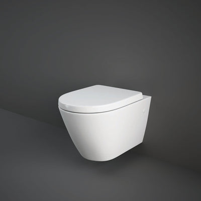 520mm Vesta Wall Hung Toilet with a seat and cover lifestyle image