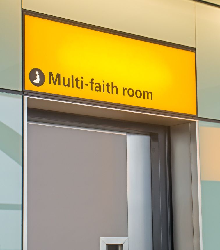 large yellow sign above a multifaith room door