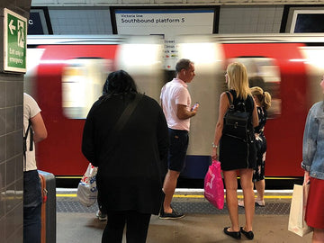 London Underground station with platform of waiting customers